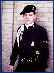 Dan Adams in dress uniform during his military police service